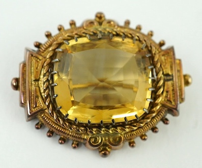 A Victorian 9ct and single stone cushion cut citrine set brooch, 40mm, gross weight 10.6 grams. Condition - fair